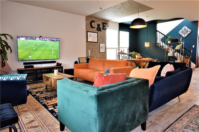 living room with light hardwood / wood-style floors