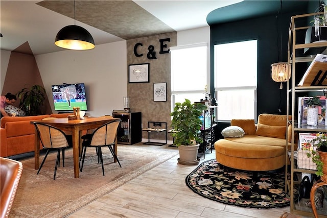 dining space with light hardwood / wood-style floors