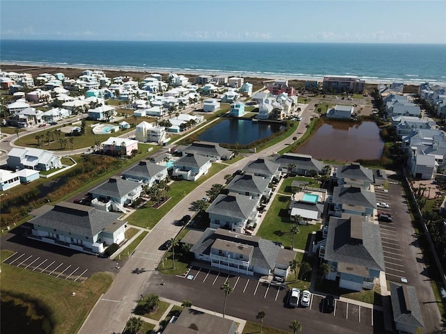 bird's eye view with a residential view and a water view