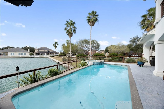 view of swimming pool featuring a pool with connected hot tub