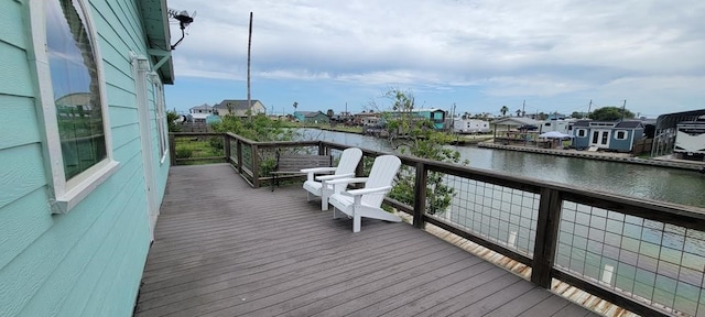619 Copano Cove Rd, Rockport, TX 78382 - deck with a water view and a residential view