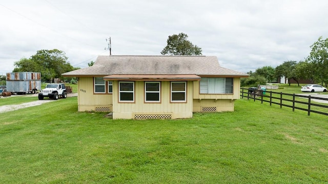 exterior space with a lawn