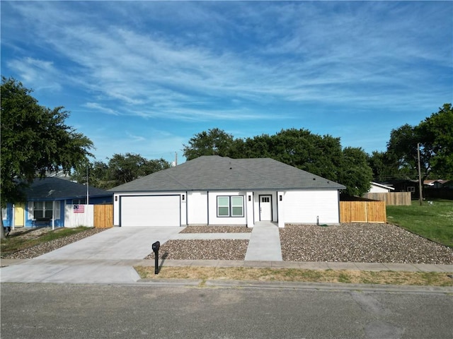 2814 Held Dr, Corpus Christi, TX 78418 - ranch-style house with concrete driveway and a garage