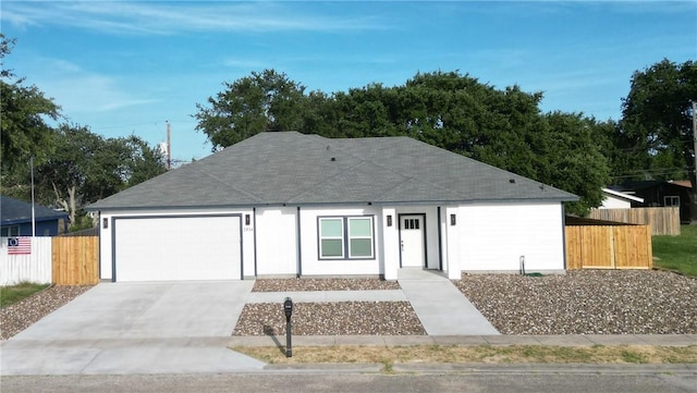 2814 Held Dr, Corpus Christi, TX 78418 - single story home with an attached garage, driveway, and a shingled roof
