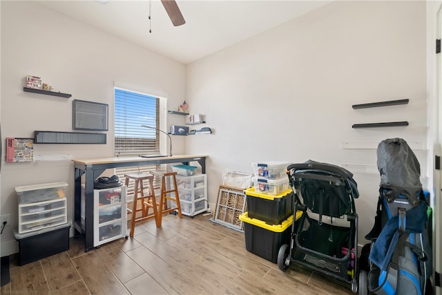 office area featuring a ceiling fan and wood tiled floor