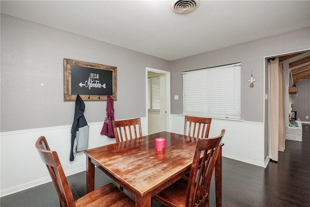 4822 Augusta Dr, Corpus Christi, TX 78413 - dining room with wood finished floors and a wainscoted wall