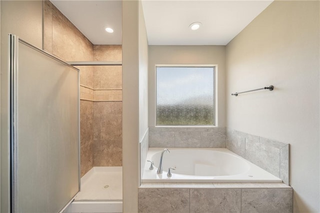 2706 Lake Rhapsody Dr, Corpus Christi, TX 78414 - full bathroom featuring a stall shower and a garden tub