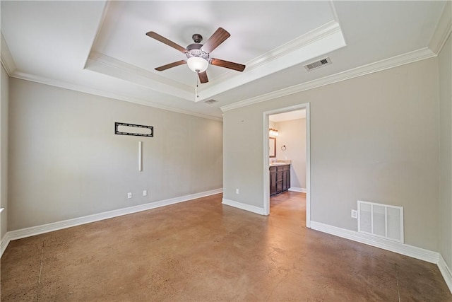 2706 Lake Rhapsody Dr, Corpus Christi, TX 78414 - spare room with concrete flooring, a ceiling fan, a raised ceiling, and ornamental molding