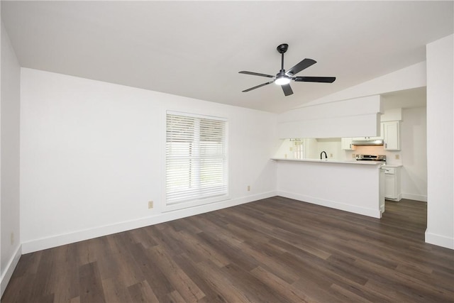 unfurnished living room with ceiling fan, dark hardwood / wood-style flooring, lofted ceiling, and sink