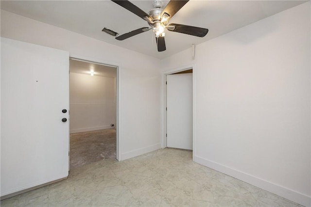 unfurnished room with ceiling fan