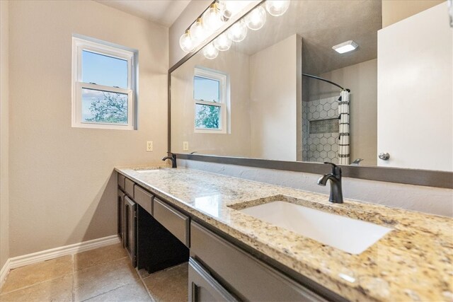 bathroom featuring a shower with curtain and vanity