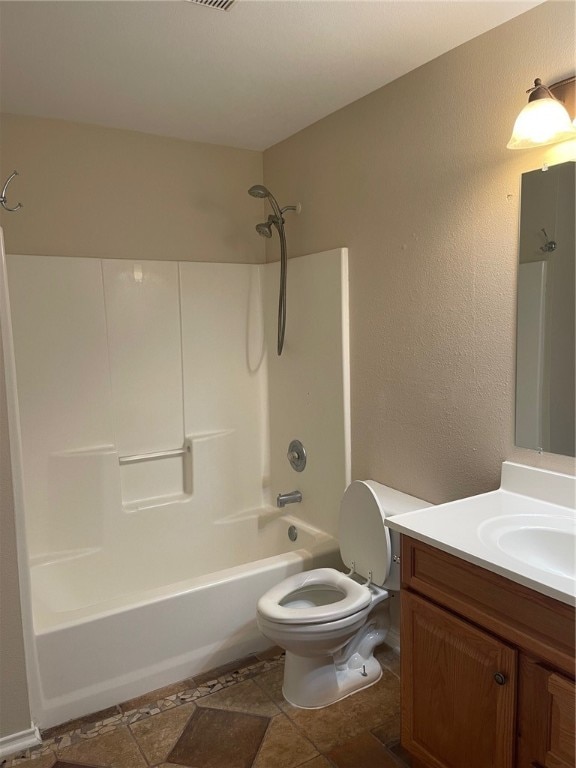 full bathroom with vanity, toilet, and shower / bath combination