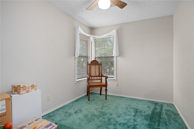 4510 Canyon Lake Cir, Corpus Christi, TX 78413 - sitting room with carpet flooring, ceiling fan, a textured ceiling, and baseboards