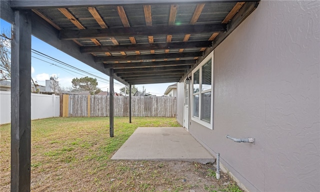 view of yard featuring a fenced backyard and a patio