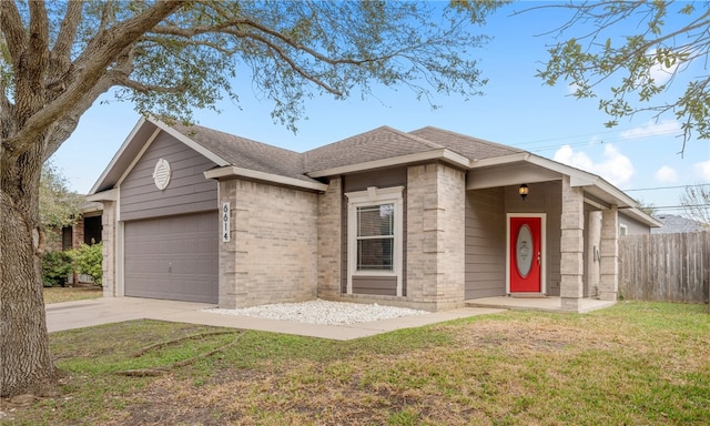 ranch-style home featuring brick siding, concrete driveway, a front yard, fence, and a garage