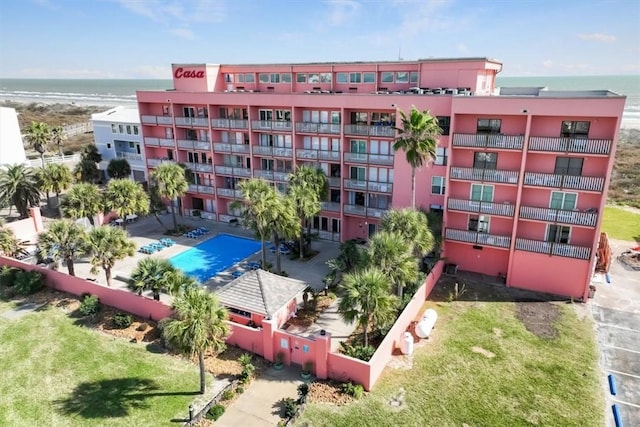 view of building exterior with a water view