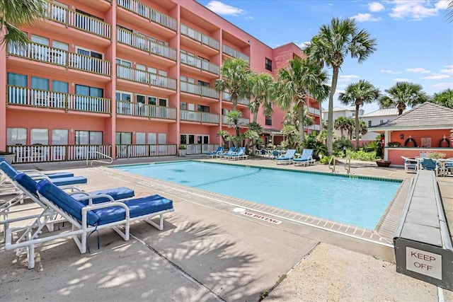 pool with a patio