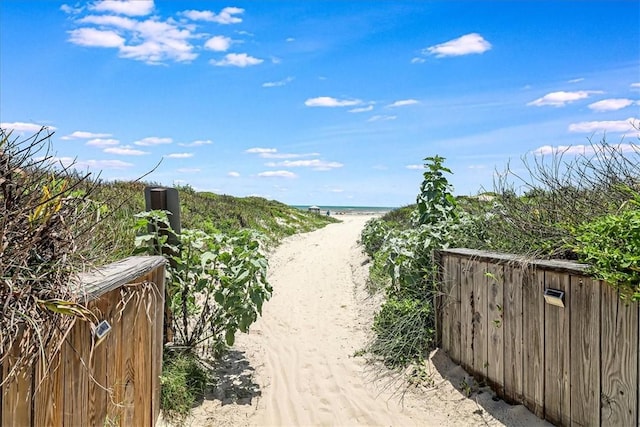 property view of water with a beach view