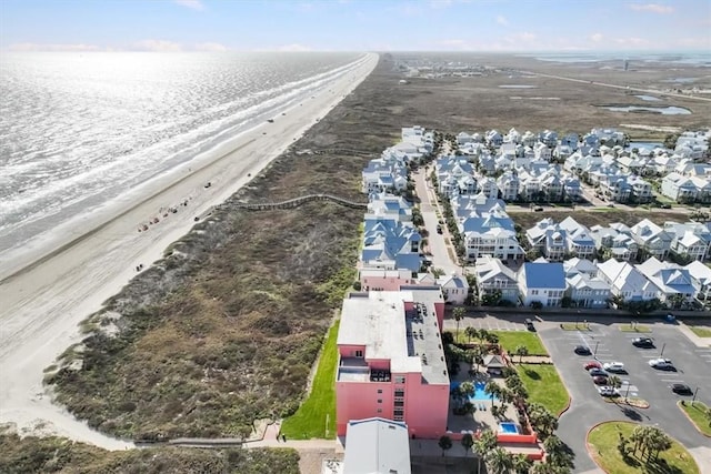 drone / aerial view featuring a water view and a residential view