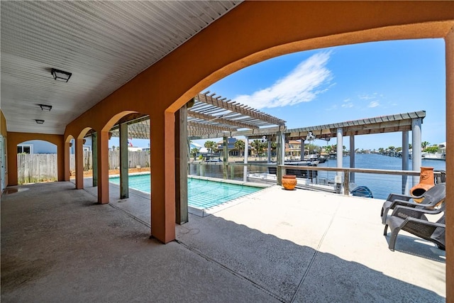 15929 San Felipe Dr, Corpus Christi, TX 78418 - view of swimming pool featuring a water view and a patio area