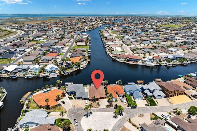 15929 San Felipe Dr, Corpus Christi, TX 78418 - aerial view of property's location with nearby suburban area and a large body of water