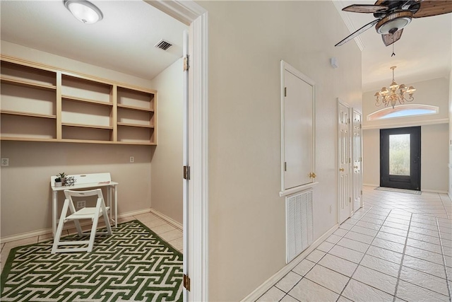 15929 San Felipe Dr, Corpus Christi, TX 78418 - foyer entrance with a chandelier, light tile patterned floors, a ceiling fan, baseboards, and vaulted ceiling