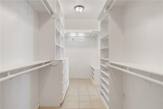 15929 San Felipe Dr, Corpus Christi, TX 78418 - walk in closet with light tile patterned floors