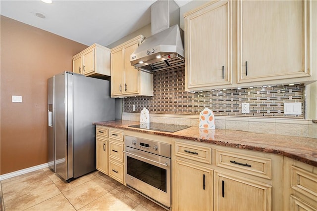 15929 San Felipe Dr, Corpus Christi, TX 78418 - kitchen featuring stainless steel appliances, wall chimney range hood, light brown cabinets, decorative backsplash, and light tile patterned floors