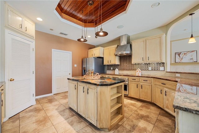 15929 San Felipe Dr, Corpus Christi, TX 78418 - kitchen with wall chimney range hood, a raised ceiling, appliances with stainless steel finishes, wooden ceiling, and tasteful backsplash