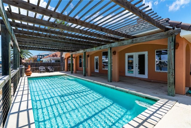 15929 San Felipe Dr, Corpus Christi, TX 78418 - view of pool with french doors, a pergola, and a patio area