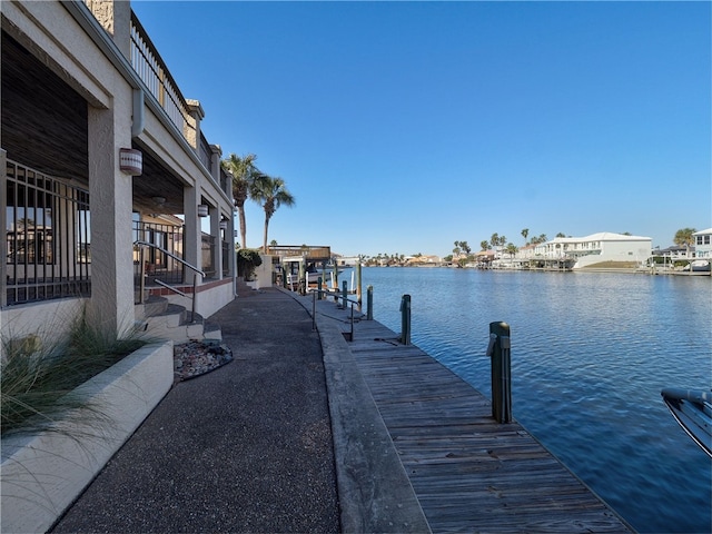 view of dock with a water view