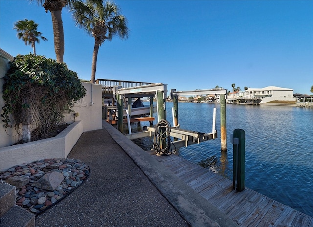 view of dock with a water view