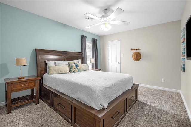 bedroom with light carpet, baseboards, and a ceiling fan