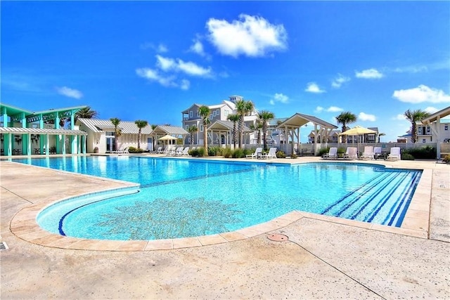 view of swimming pool featuring a patio