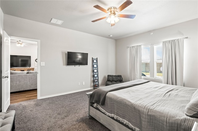 1345 Regents Park, Corpus Christi, TX 78415 - carpeted bedroom featuring baseboards and a ceiling fan