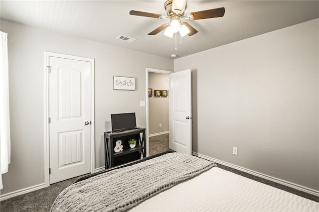 1345 Regents Park, Corpus Christi, TX 78415 - bedroom featuring dark colored carpet, baseboards, and ceiling fan