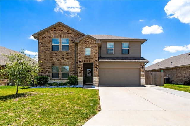1345 Regents Park, Corpus Christi, TX 78415 - traditional home with brick siding, driveway, an attached garage, and central AC