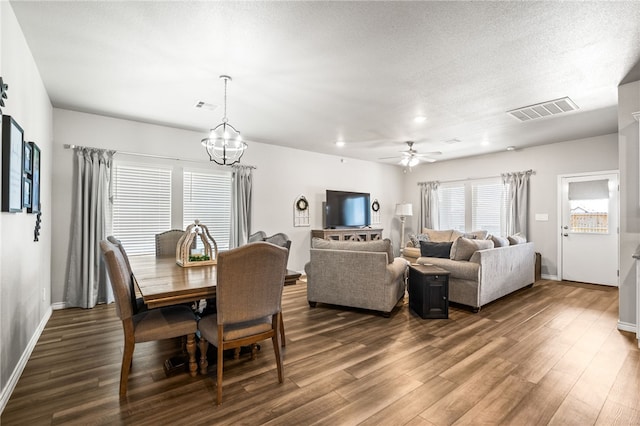 1345 Regents Park, Corpus Christi, TX 78415 - dining space with dark wood-style flooring, baseboards, a chandelier, a ceiling fan, and recessed lighting