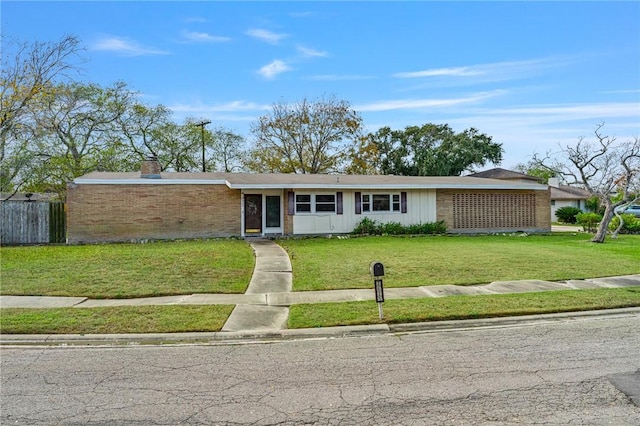 single story home with a front lawn