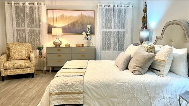 bedroom featuring light hardwood / wood-style floors