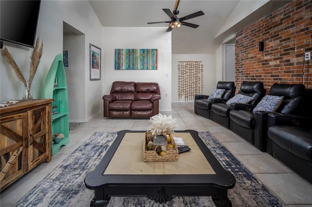 1703 Bayshores, Rockport, TX 78382 - living room featuring lofted ceiling, tile patterned floors, ceiling fan, and baseboards