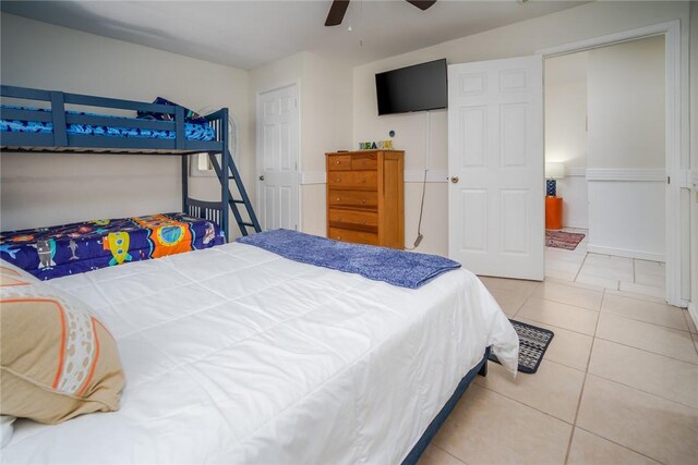 1703 Bayshores, Rockport, TX 78382 - tiled bedroom with ceiling fan