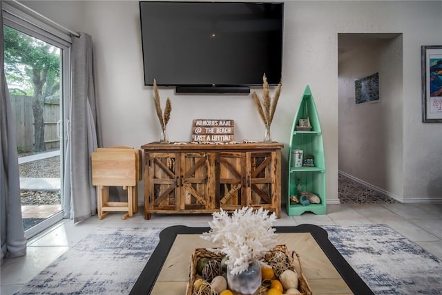 1703 Bayshores, Rockport, TX 78382 - tiled living area featuring baseboards