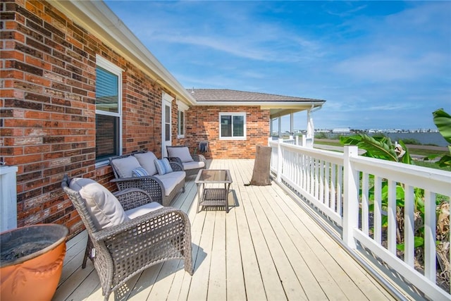 1703 Bayshores, Rockport, TX 78382 - wooden deck featuring an outdoor hangout area