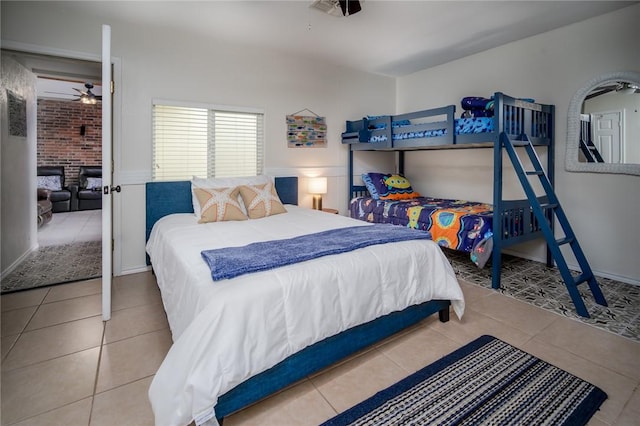 1703 Bayshores, Rockport, TX 78382 - tiled bedroom featuring a fireplace