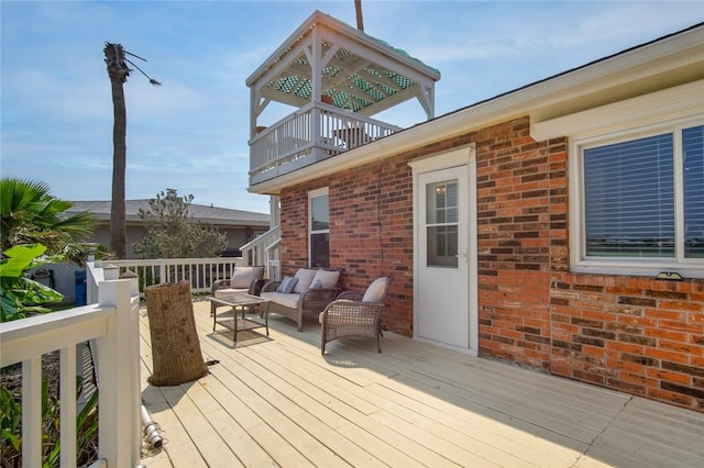 1703 Bayshores, Rockport, TX 78382 - wooden deck featuring an outdoor living space