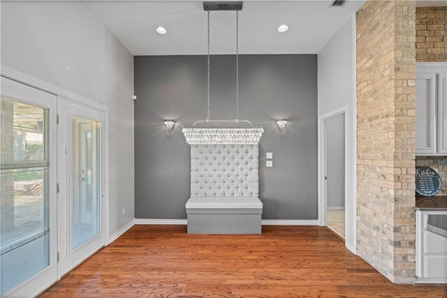 108 Black Diamond, Portland, TX 78374 - hall featuring a high ceiling, wood finished floors, and baseboards