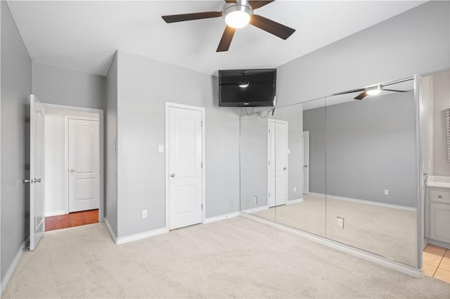 108 Black Diamond, Portland, TX 78374 - unfurnished bedroom with light carpet, a ceiling fan, ensuite bathroom, and baseboards