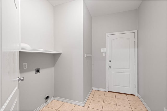 108 Black Diamond, Portland, TX 78374 - washroom featuring electric dryer hookup, light tile patterned flooring, and baseboards