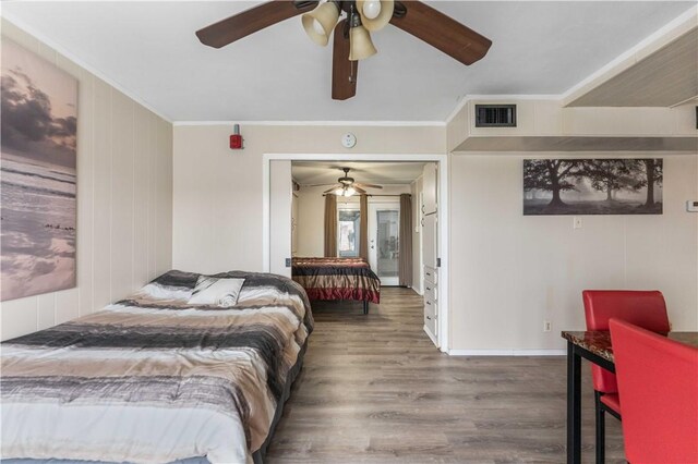 14300 S Padre Island Dr Unit 207, Corpus Christi, TX 78418 - bedroom featuring wood finished floors, ornamental molding, and ceiling fan